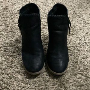 Maurice’s black booties.